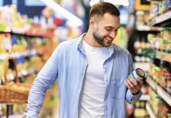 man looking at a product