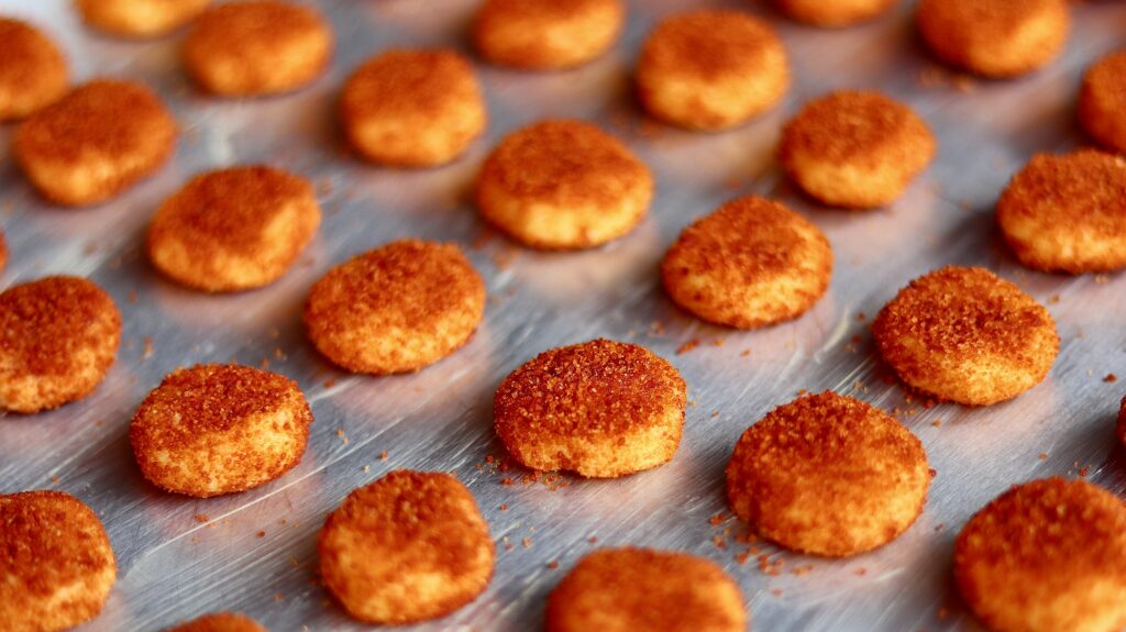 Baked Crispy Chicken Nuggets on Stainless Steel Tray