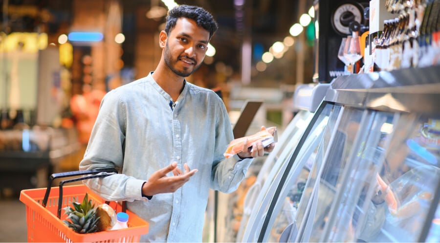 man looking at a product